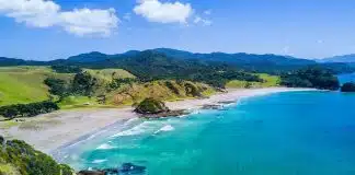 aerial view of beach with mountains